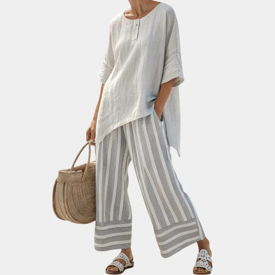 Fiorella | Elegant asymmetrical blouse and striped trousers
