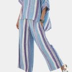 Yasmine | Elegant pastel mauve top and striped trousers