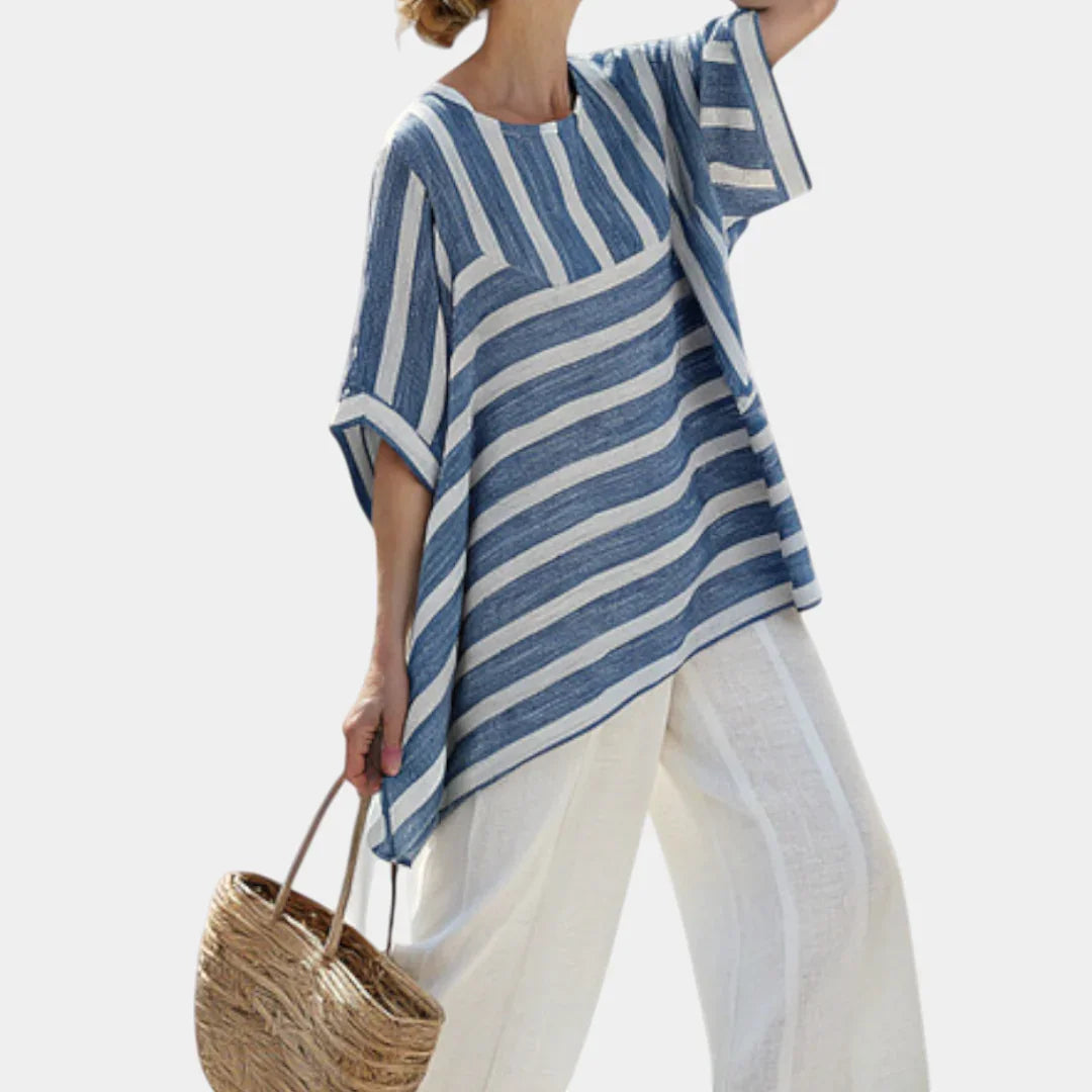 Ornela | Sophisticated blue striped top and trousers with details at the hem.