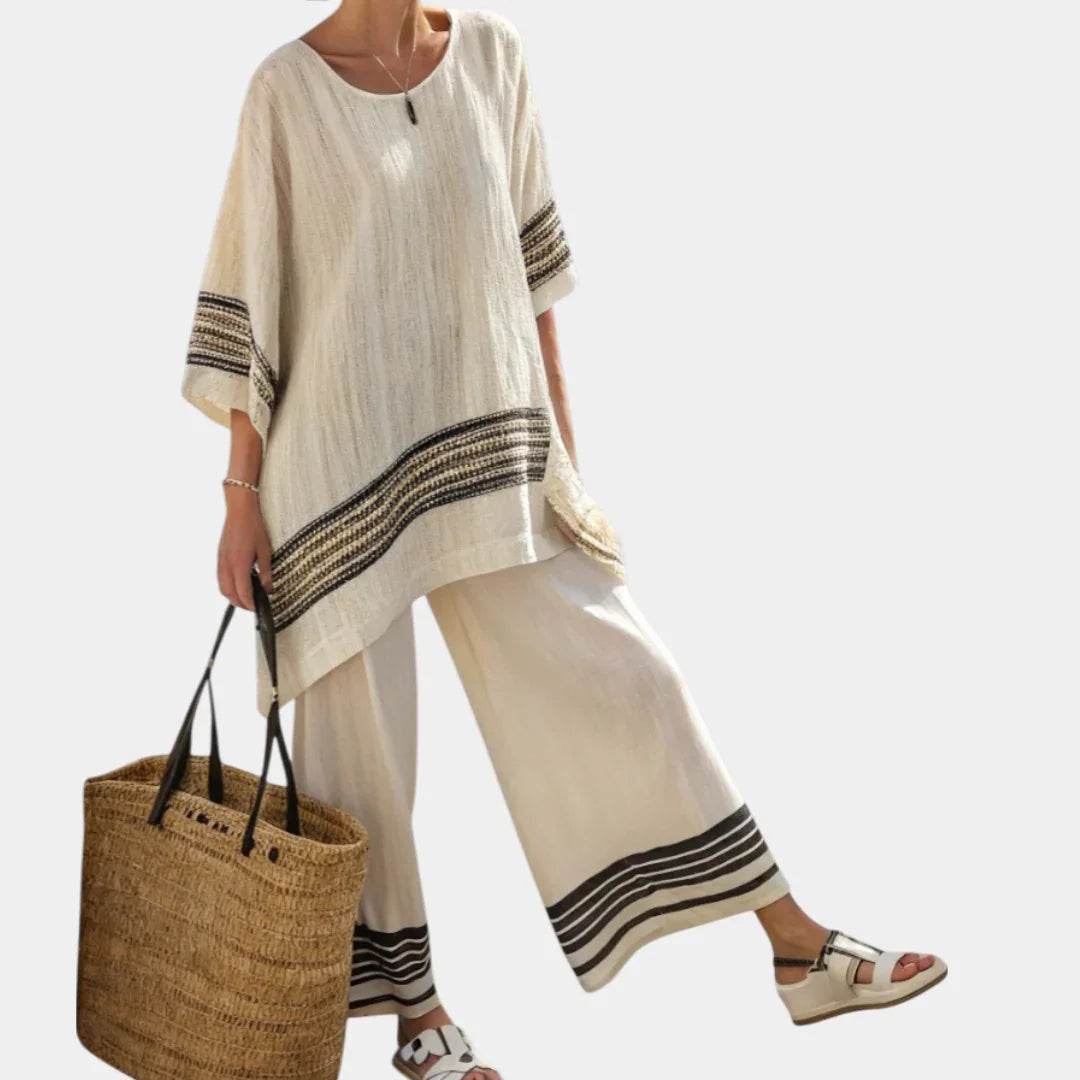 Mariella | Elegant black striped top and flowing trousers