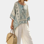 Annalisa | Comfortable printed blouse and wide-leg white trousers
